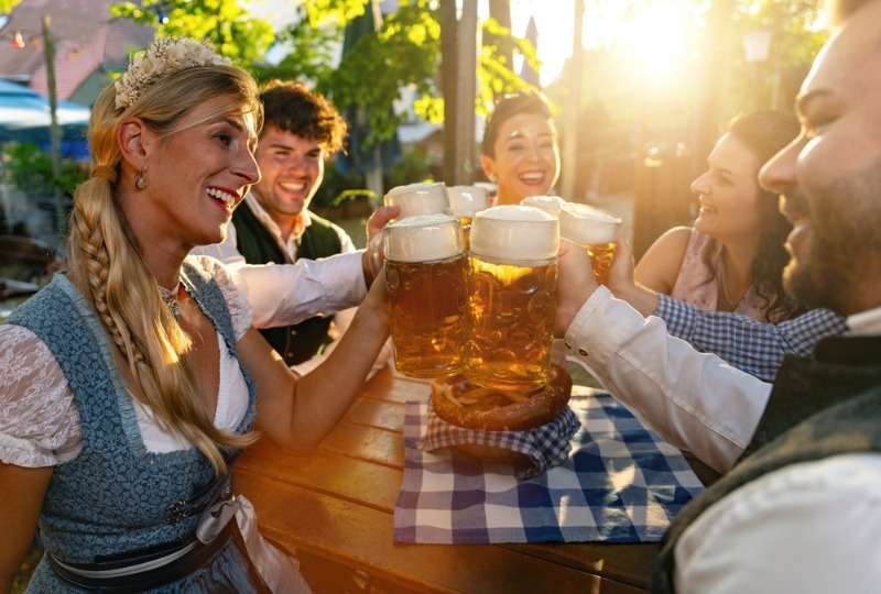 Octoberfest in Washington State: A group of 30-somethings clang their beer-filled mugs in celebration of Oktoberfest.
