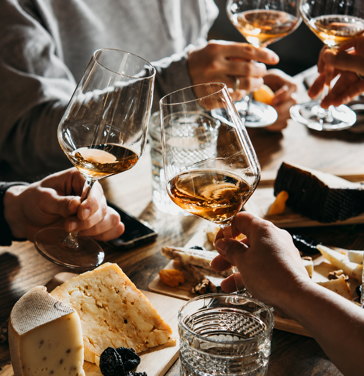 Wine glasses and a cheese board